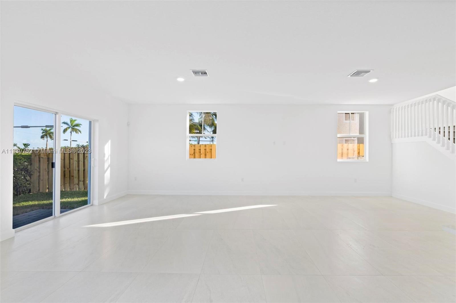 24721 Southwest 112th Court Homestead, FL 33032 - Photo 10 of 40 an empty room with windows