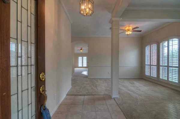 a view of gallery with windows