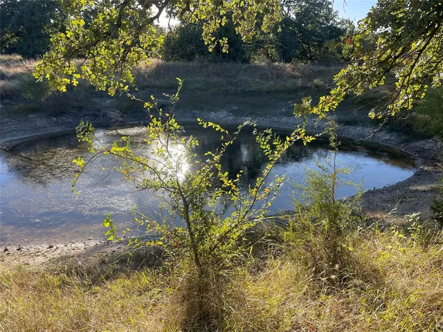 a living room with lots of furniture and a flat screen tv