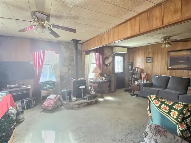 a bedroom with bed and a dresser