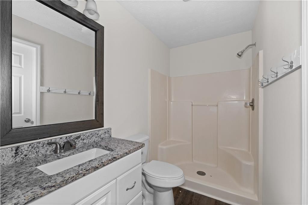 5900 Jacobs Road Acworth, GA 30102 - Photo 11 of 18 a bathroom with a sink and a mirror