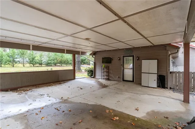 a view of a room with a large window