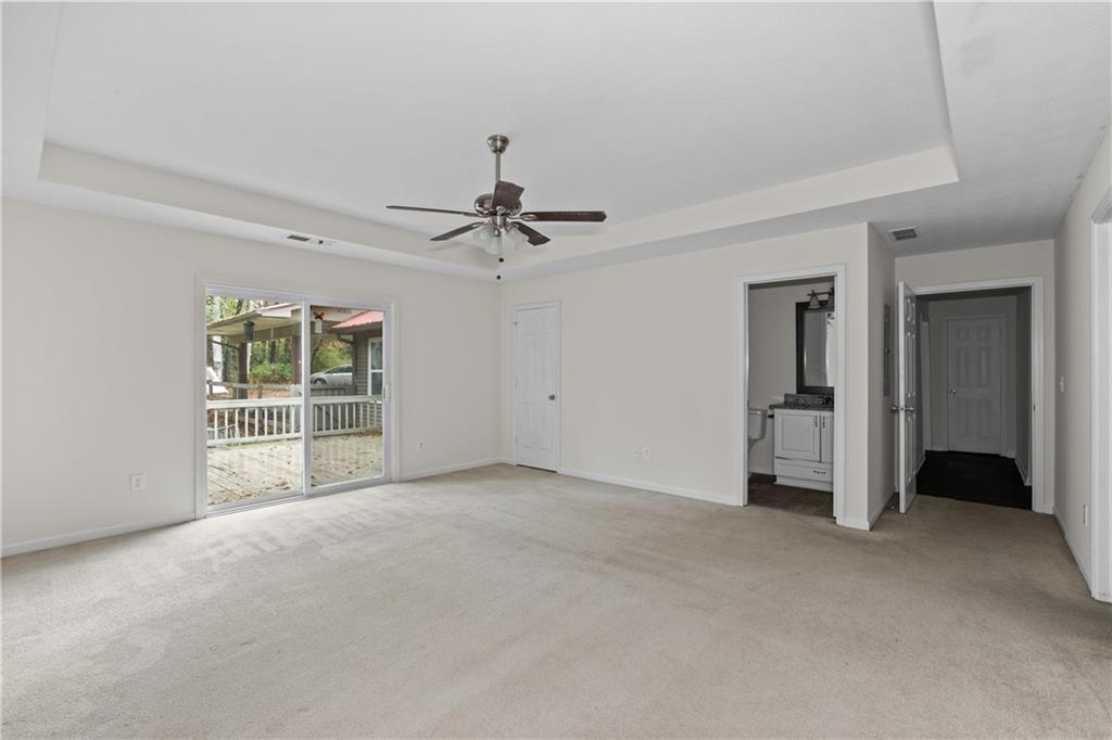 5900 Jacobs Road Acworth, GA 30102 - Photo 9 of 18 a view of a livingroom with a ceiling fan