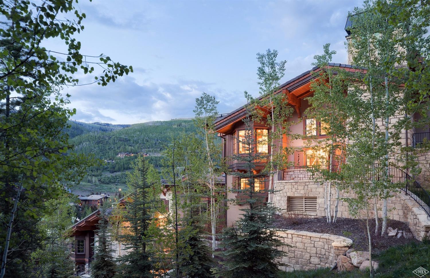 151 Vail Road, Unit 3 Vail, CO 81657 - Photo 21 of 25 a view of a house with a yard and potted plants