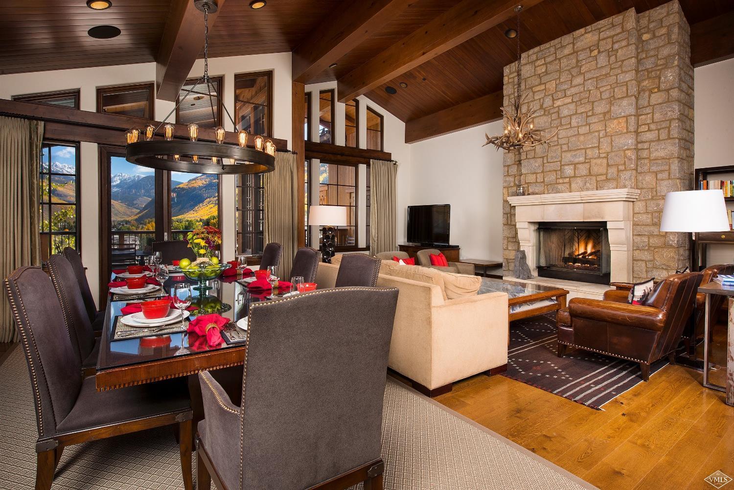 151 Vail Road, Unit 3 Vail, CO 81657 - Photo 4 of 25 a living room with furniture and a fireplace