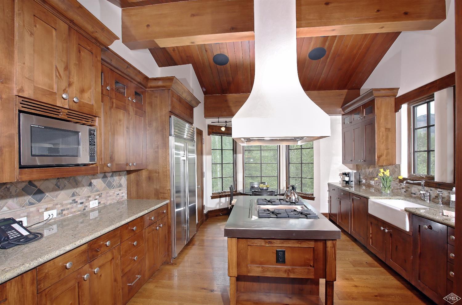 151 Vail Road, Unit 3 Vail, CO 81657 - Photo 9 of 25 a spacious bathroom with a granite countertop sink a mirror and a bathtub