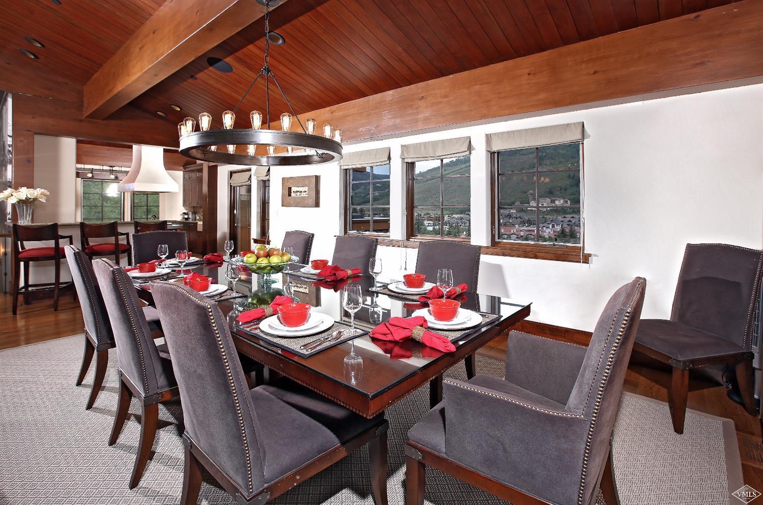 151 Vail Road, Unit 3 Vail, CO 81657 - Photo 10 of 25 a view of a dining room with furniture window and outside view