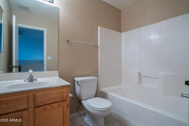 a bathroom with a sink toilet and a bathtub