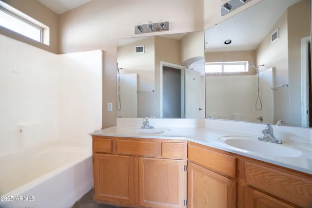 a bathroom with a sink and a bathtub