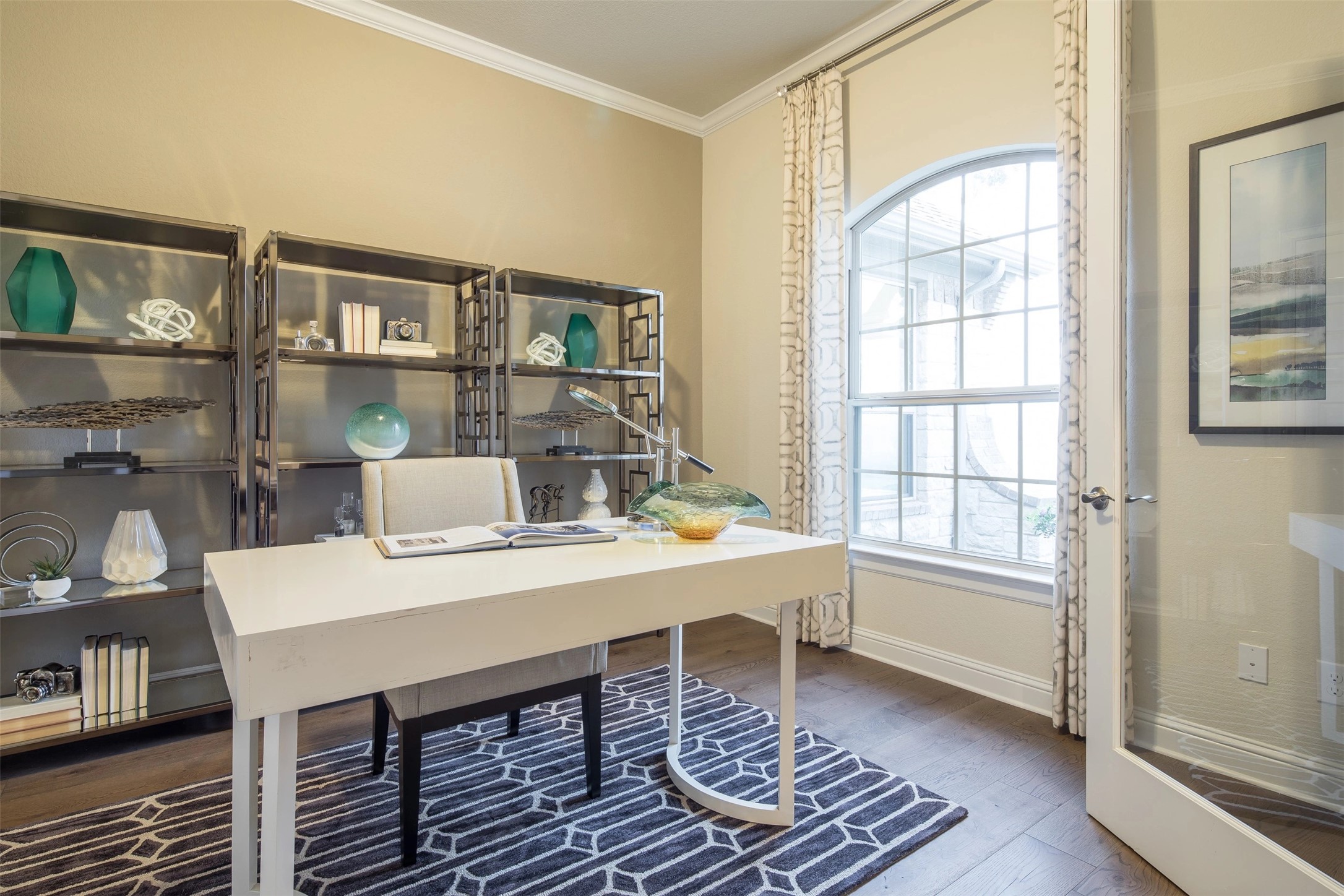 1229 Terrace View Drive Georgetown, TX 78628 - Photo 4 of 17 An inviting home office boasts rich hardwood floors and an arched window.