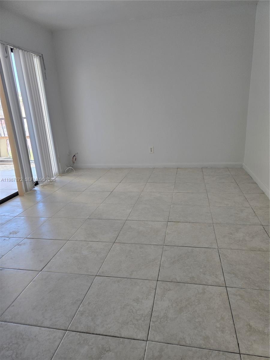 3400 Foxcroft Road, Unit 209 Miramar, FL 33025 - Photo 14 of 19 a view of a room with an empty space and a sink