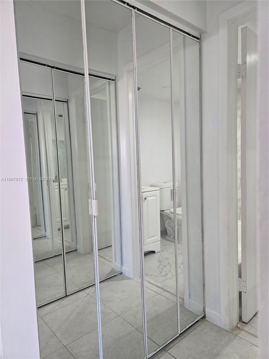3400 Foxcroft Road, Unit 209 Miramar, FL 33025 - Photo 15 of 19 a bathroom with a shower and a sink