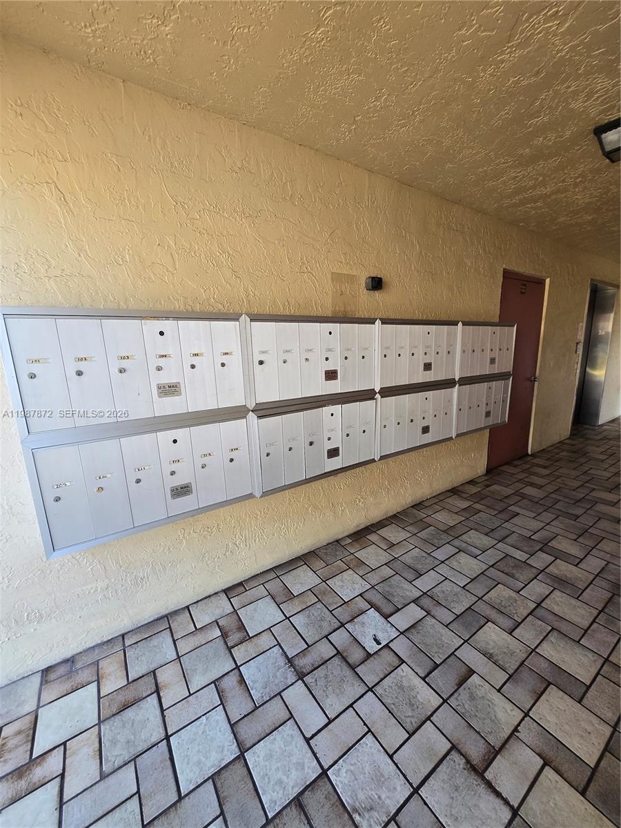 3400 Foxcroft Road, Unit 209 Miramar, FL 33025 - Photo 3 of 19 a view of a dresser