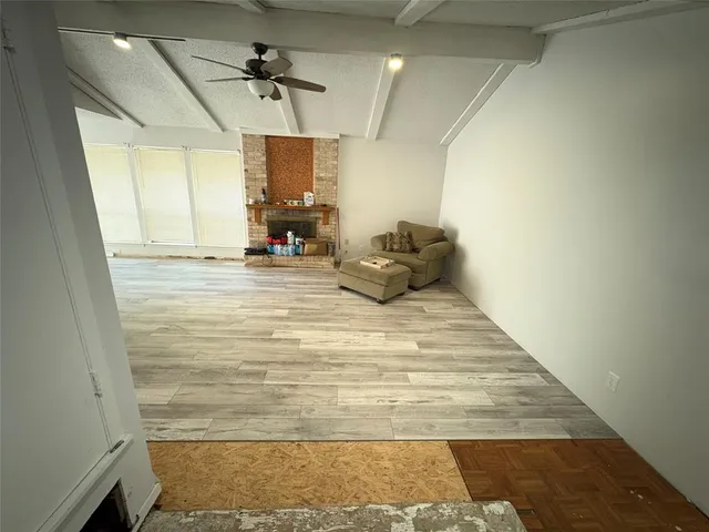 a room with hard wood floor