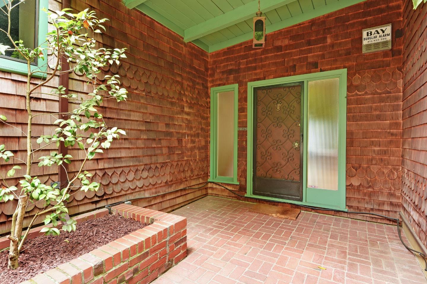 1434 Queens Road Berkeley, CA 94708 - Photo 4 of 32 a couple of potted plants in front of door
