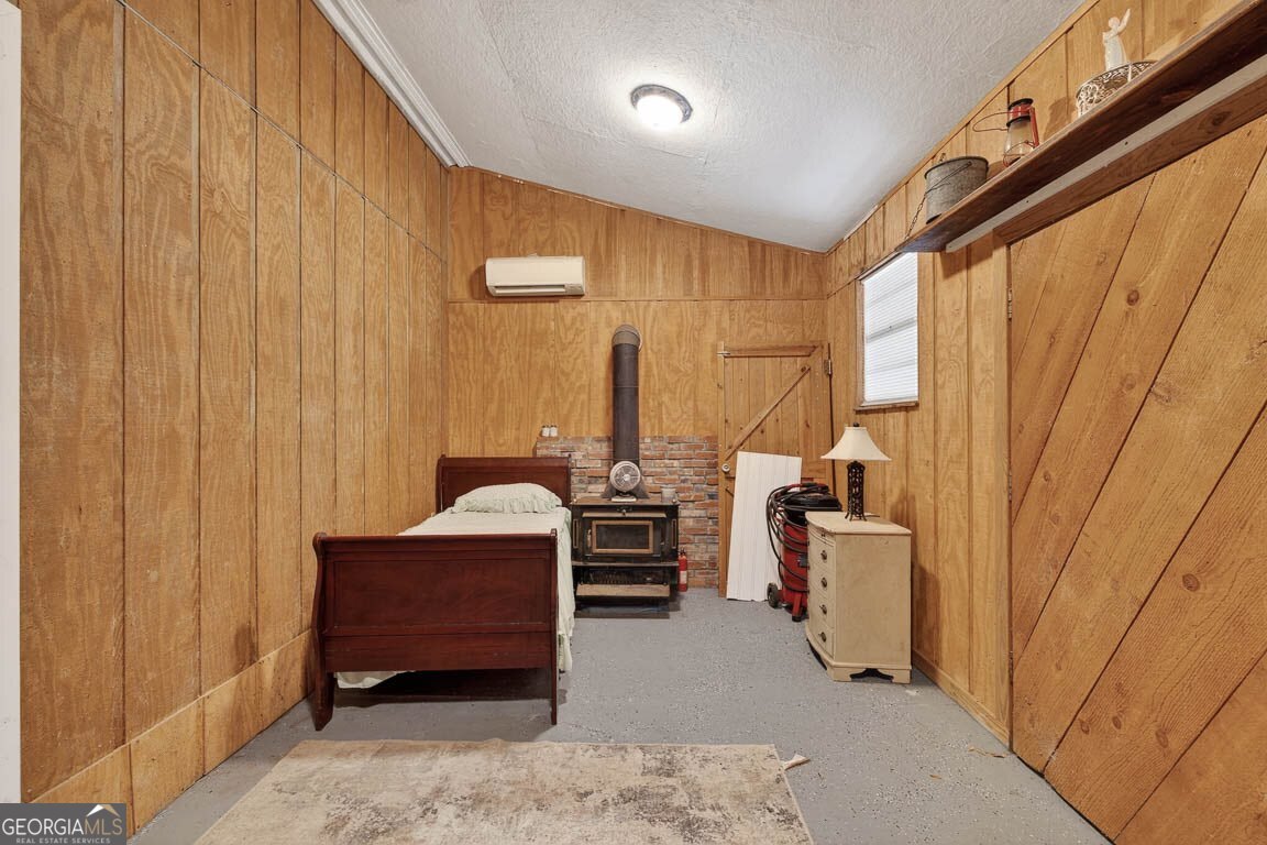 33 Warren Avenue Waverly, GA 31565 - Photo 24 of 63 a bedroom with furniture and window