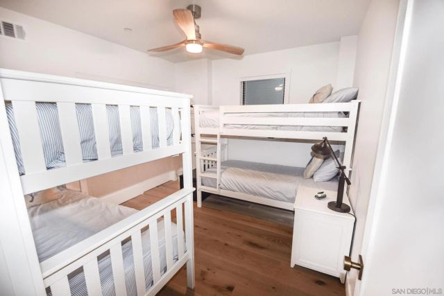 a view of front door and bedroom