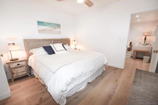 a bed room with a bed and a couch