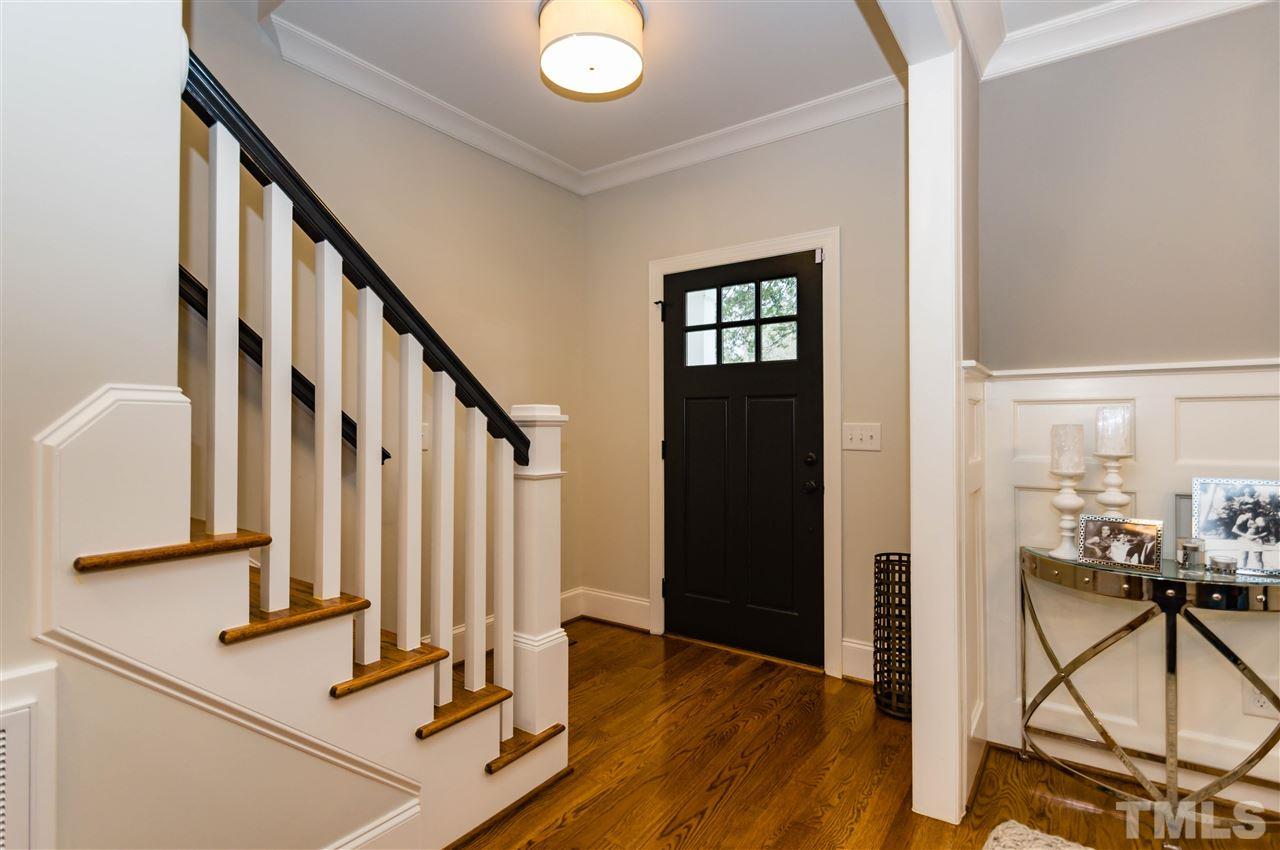 511 Mial Street Raleigh, NC 27608 - Photo 3 of 25 a view of front door with dining room and stairs