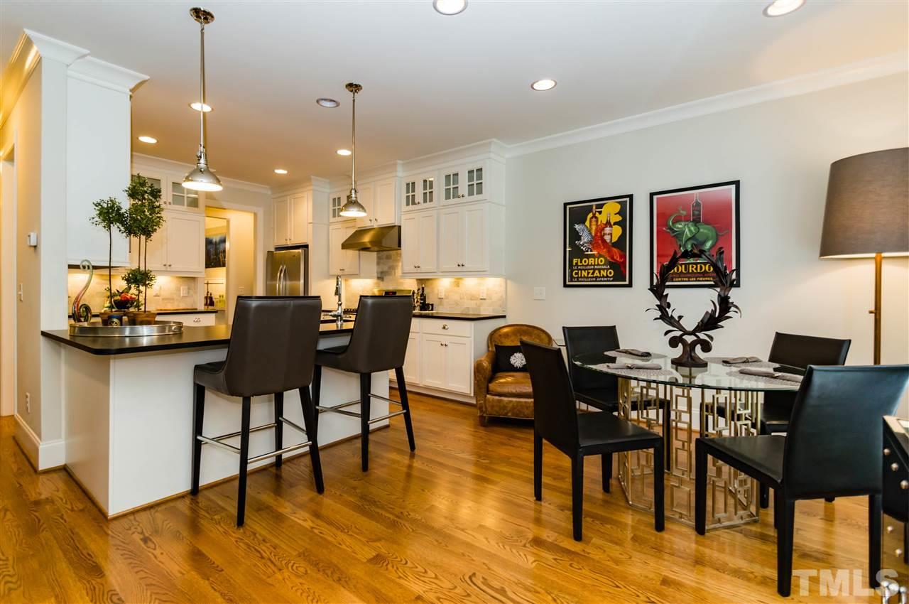 511 Mial Street Raleigh, NC 27608 - Photo 8 of 25 a view of a dining room with furniture and wooden floor
