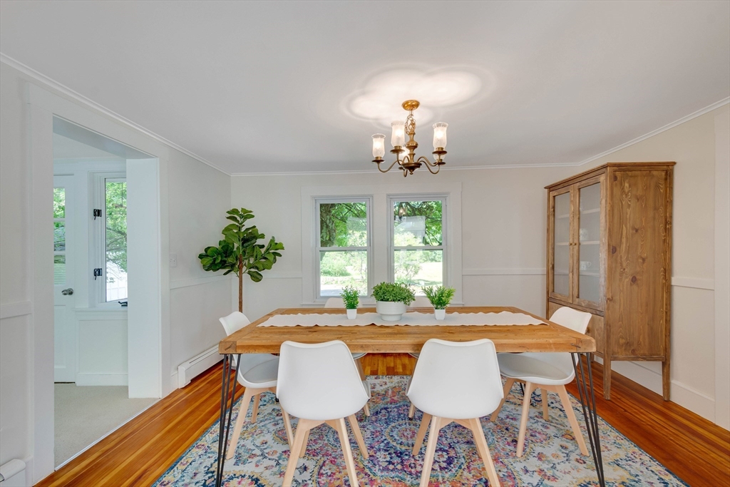 95 Tower Road Lincoln, MA 01773 - Photo 11 of 41 a view of a dining room with furniture and window