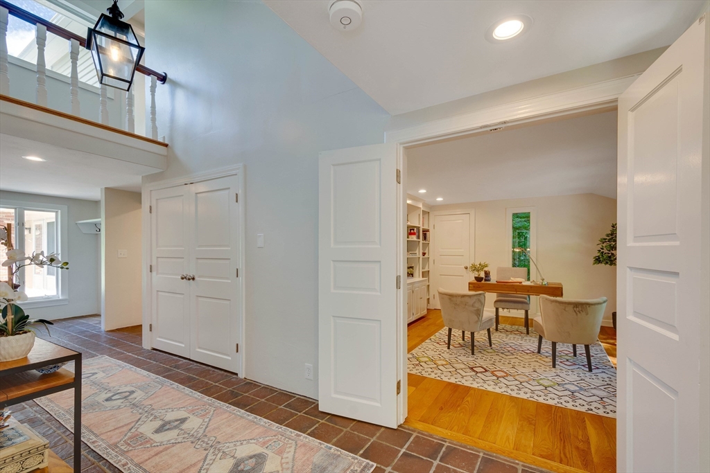 95 Tower Road Lincoln, MA 01773 - Photo 16 of 41 a view of a livingroom with furniture and a dining table