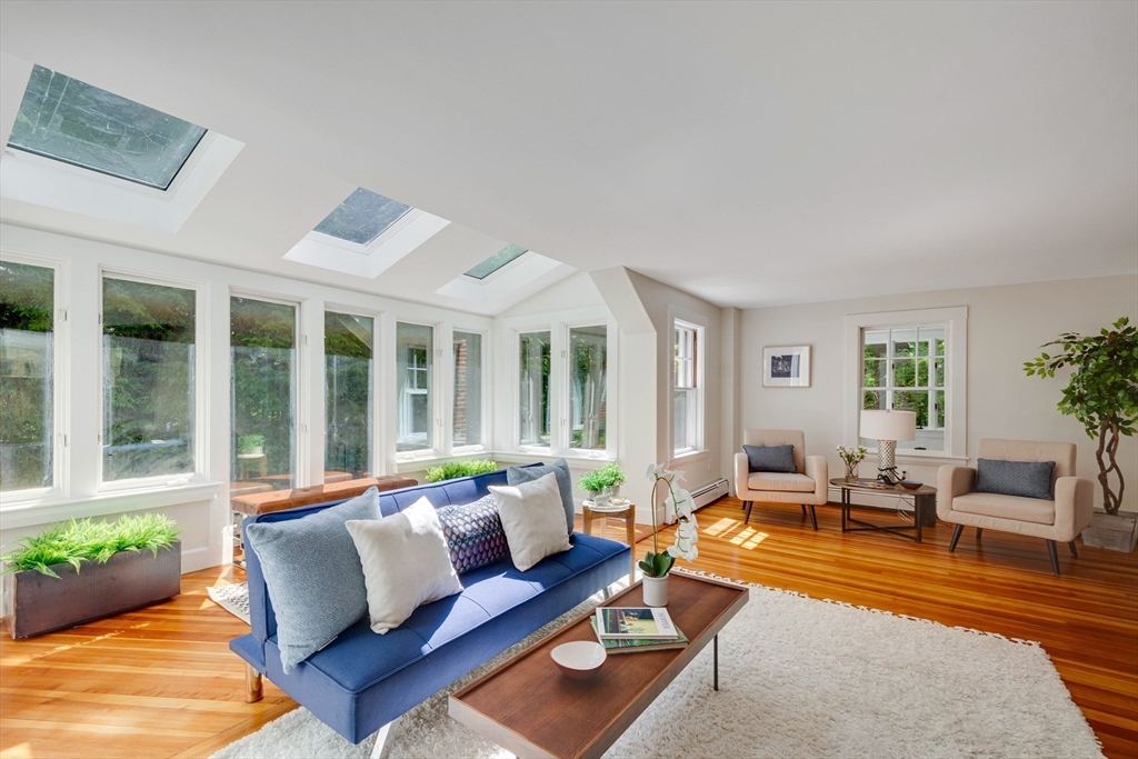 95 Tower Road Lincoln, MA 01773 - Photo 2 of 41 a living room with furniture and large windows