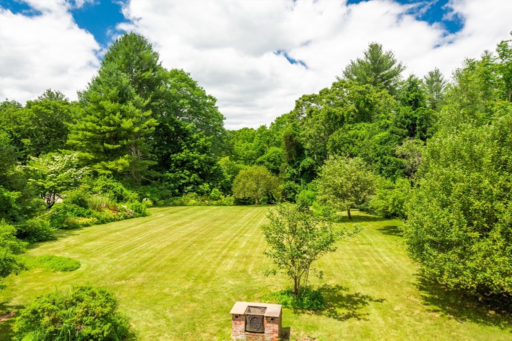 95 Tower Road Lincoln, MA 01773 - Photo 22 of 41 a view of a yard with an outdoor space
