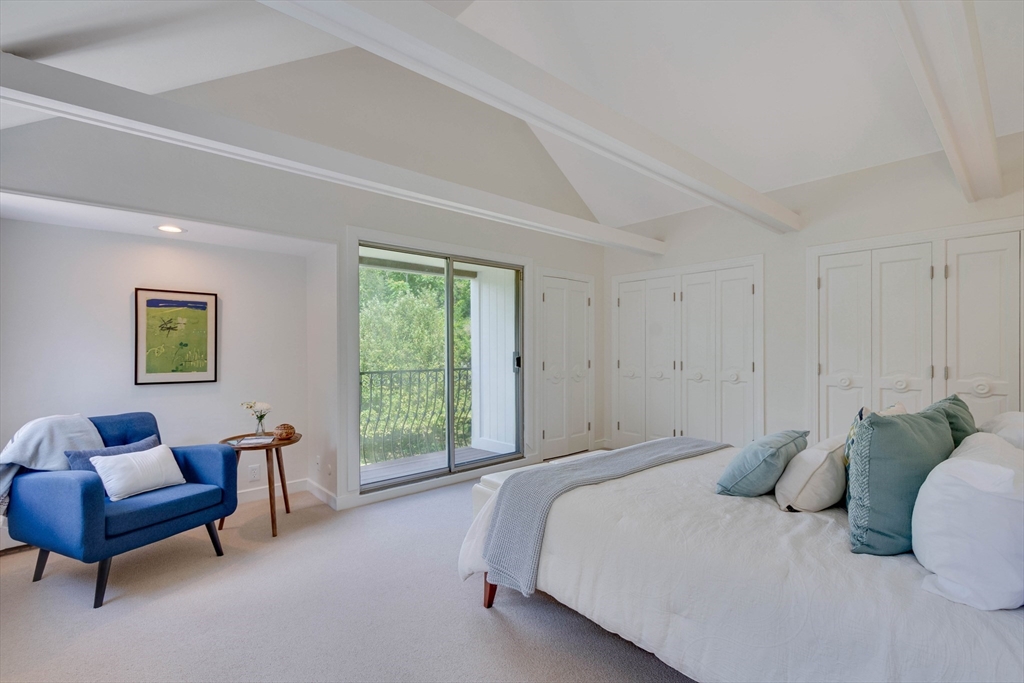 95 Tower Road Lincoln, MA 01773 - Photo 23 of 41 a bedroom with bed and a couch