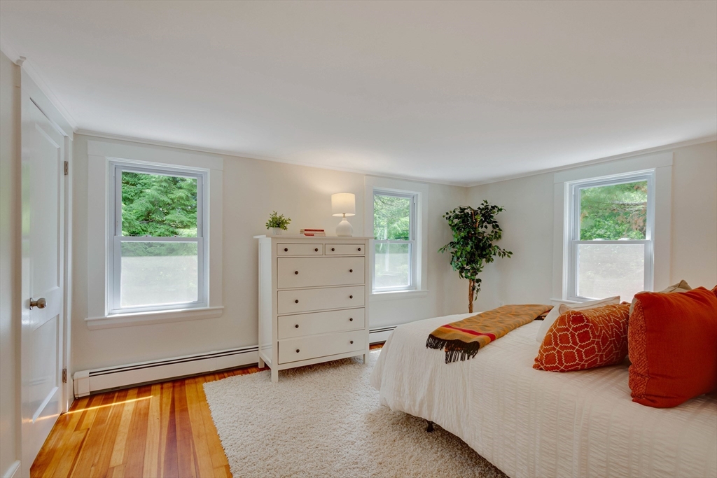 95 Tower Road Lincoln, MA 01773 - Photo 27 of 41 a bedroom with a bed and window