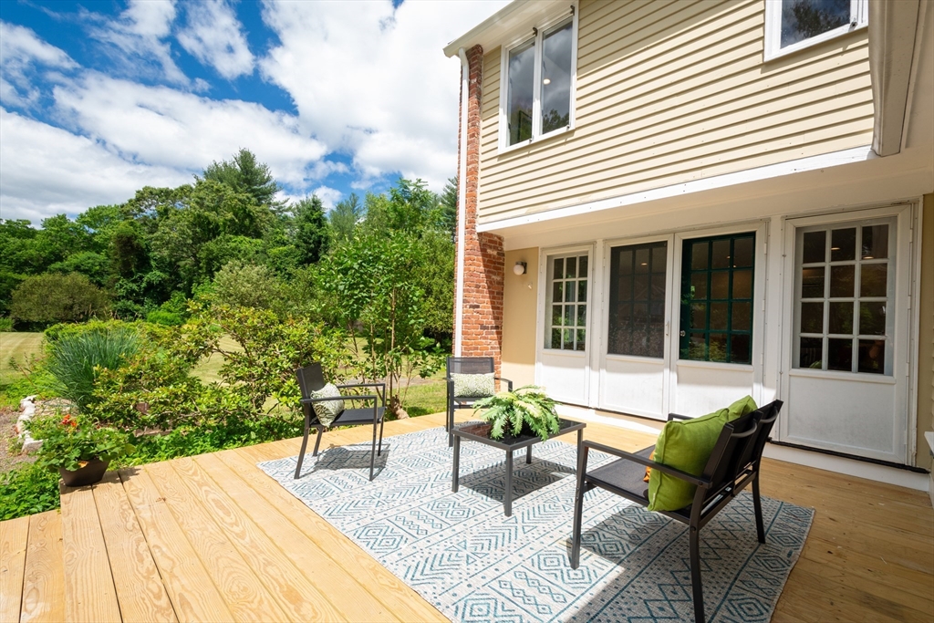 95 Tower Road Lincoln, MA 01773 - Photo 36 of 41 a view of a two chairs in the patio