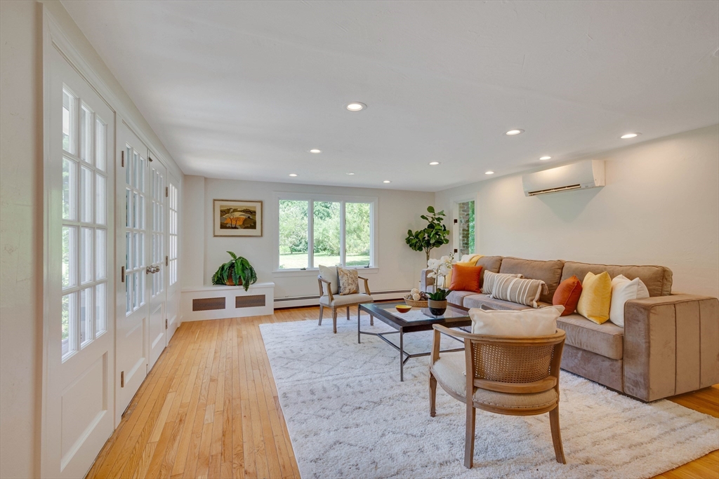 95 Tower Road Lincoln, MA 01773 - Photo 5 of 41 a living room with furniture and a table