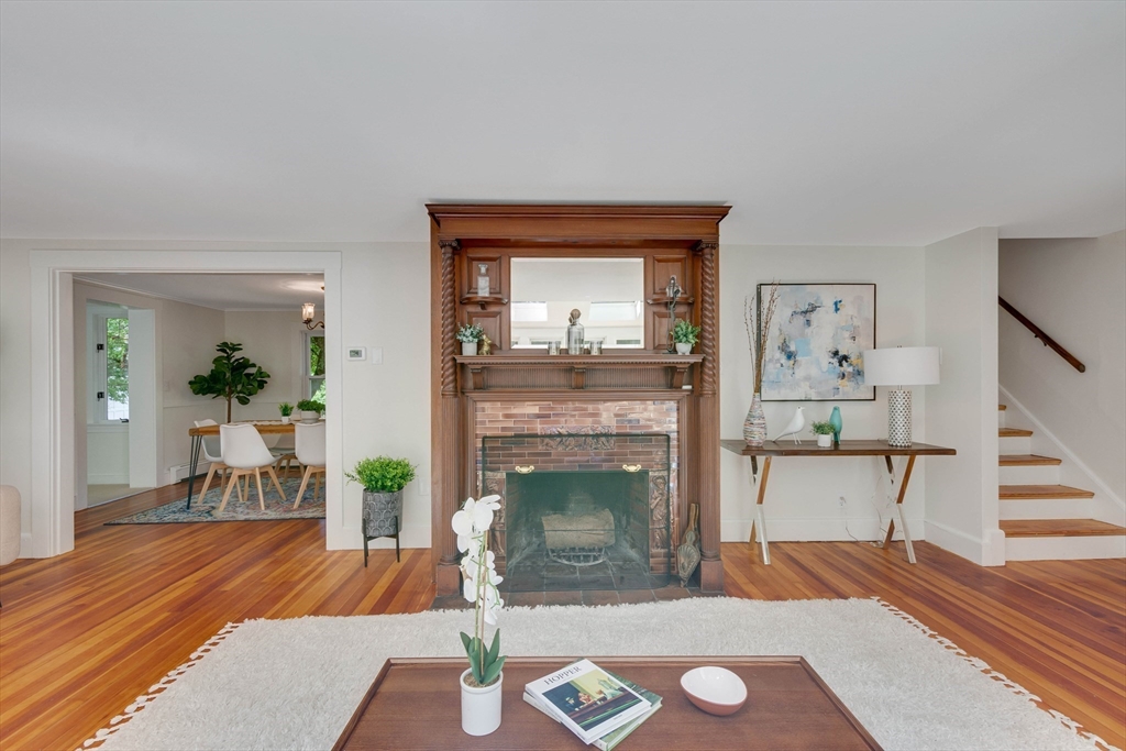 95 Tower Road Lincoln, MA 01773 - Photo 9 of 41 a living room with furniture and a fireplace