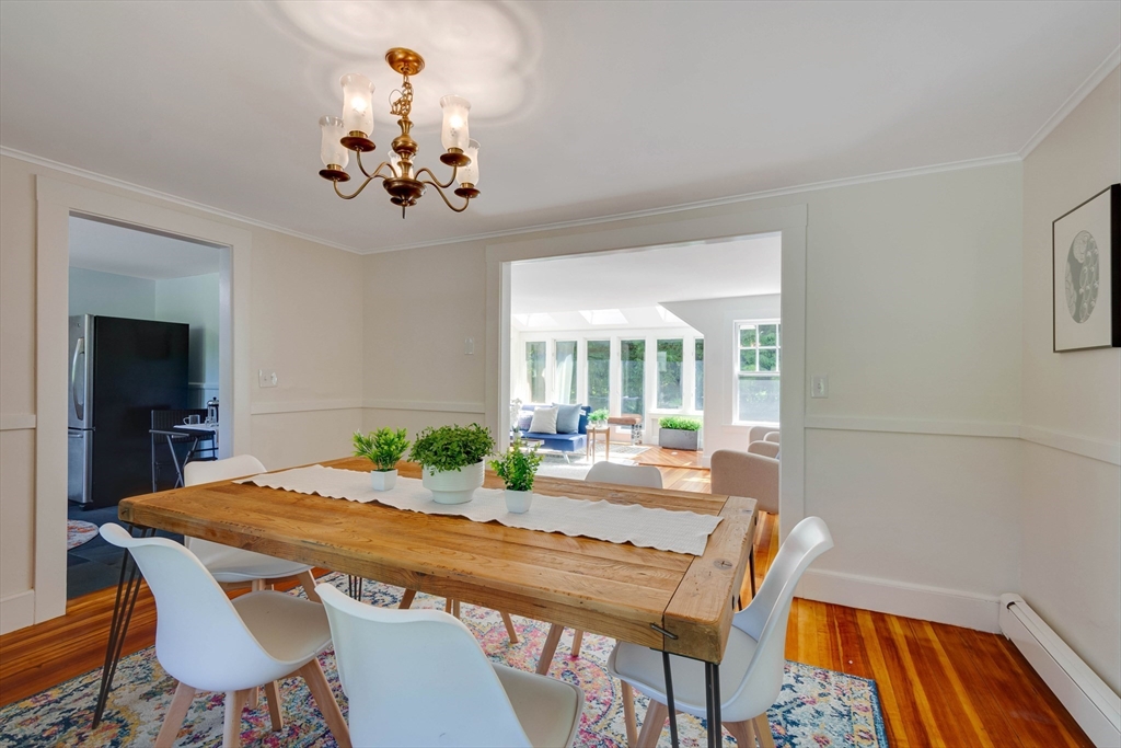95 Tower Road Lincoln, MA 01773 - Photo 10 of 41 a view of a dining room with furniture window and outside view