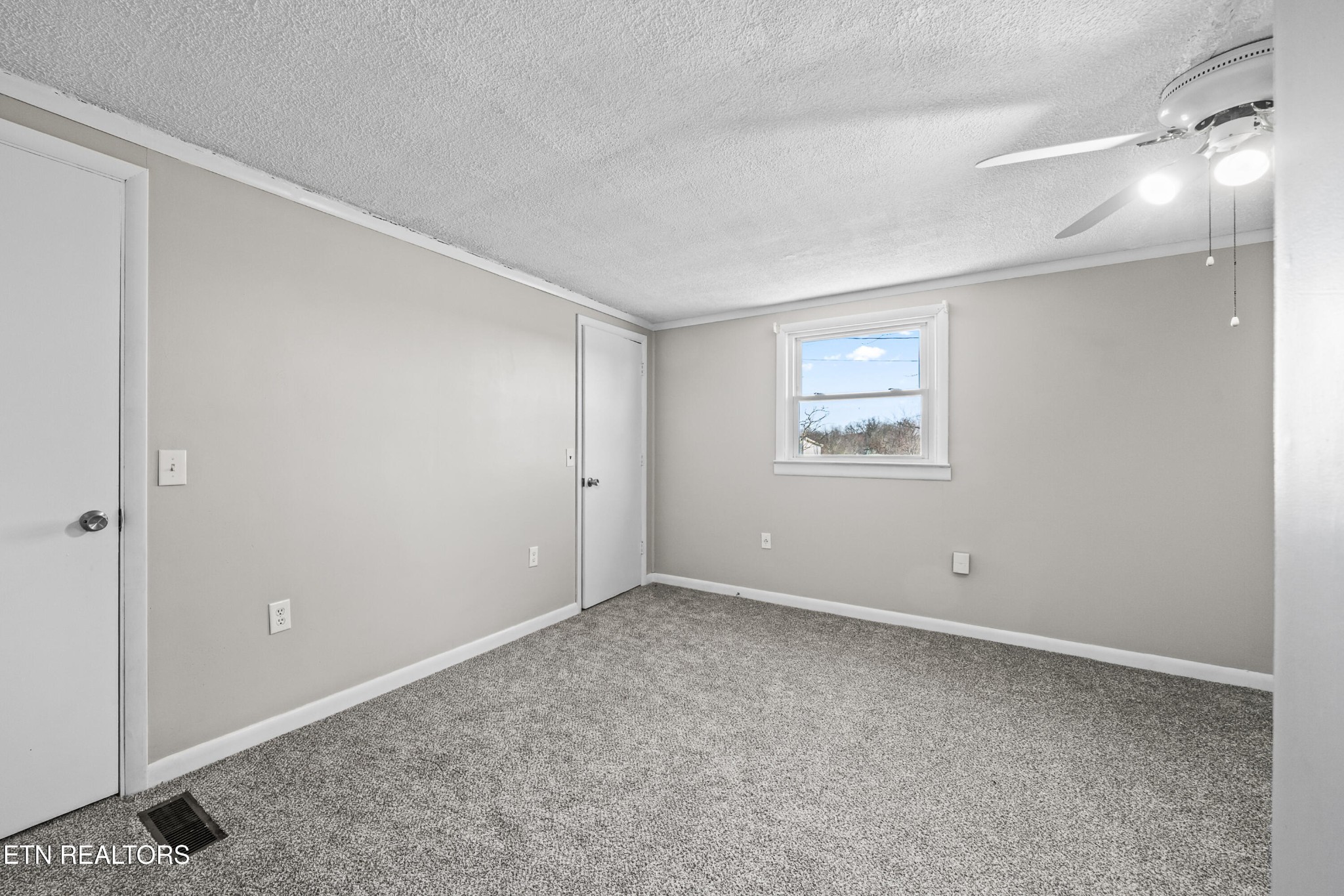 3323 Fisk Road Cookeville, TN 38506 - Photo 15 of 31 a view of an empty room with a window