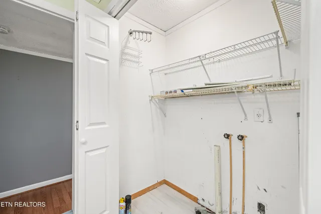 a view of a room with rack on the wall