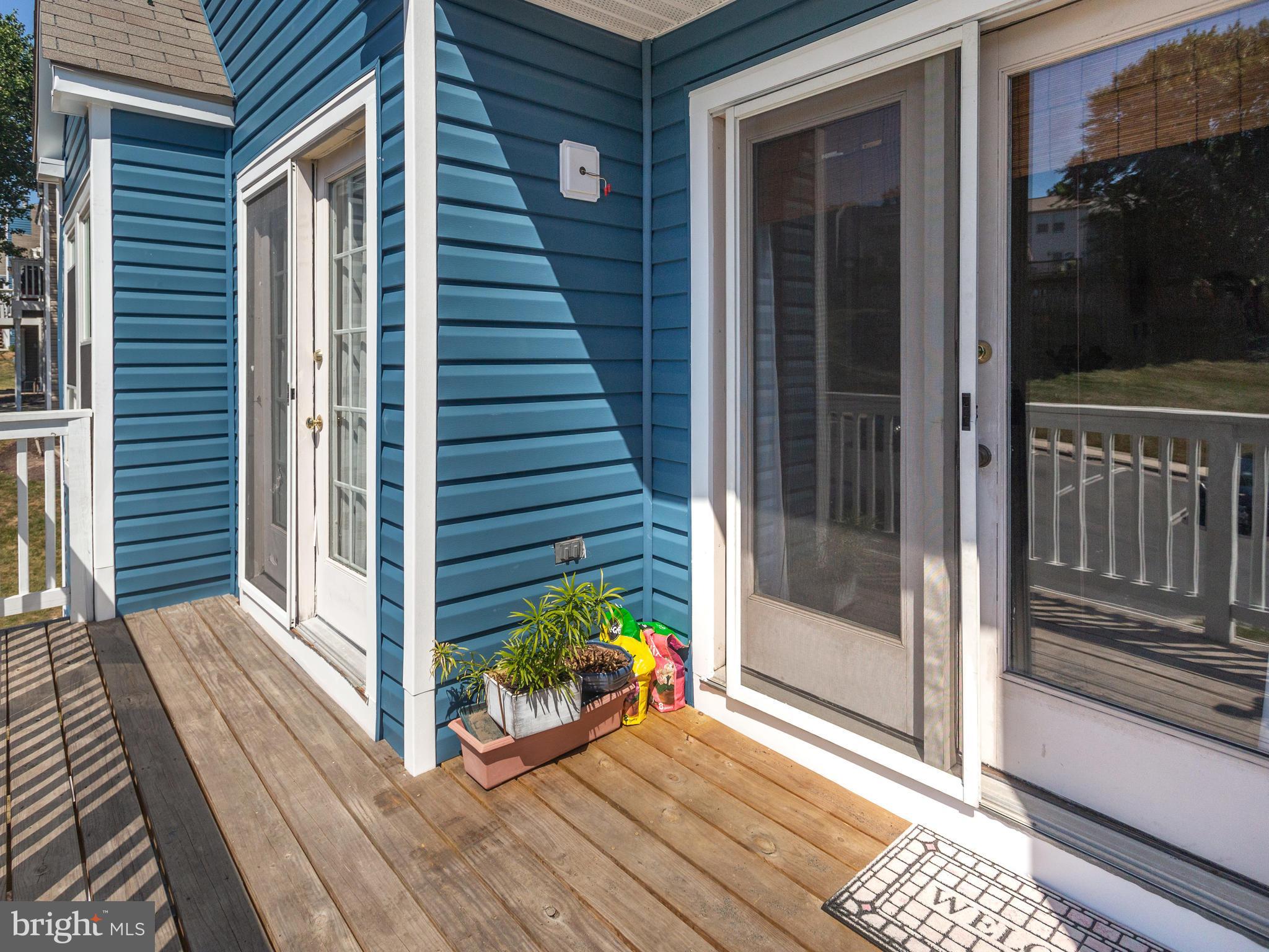 6400 Greenfield Road, Unit 908 Elkridge, MD 21075 - Photo 18 of 21 Access to the deck from the Master BR and LR