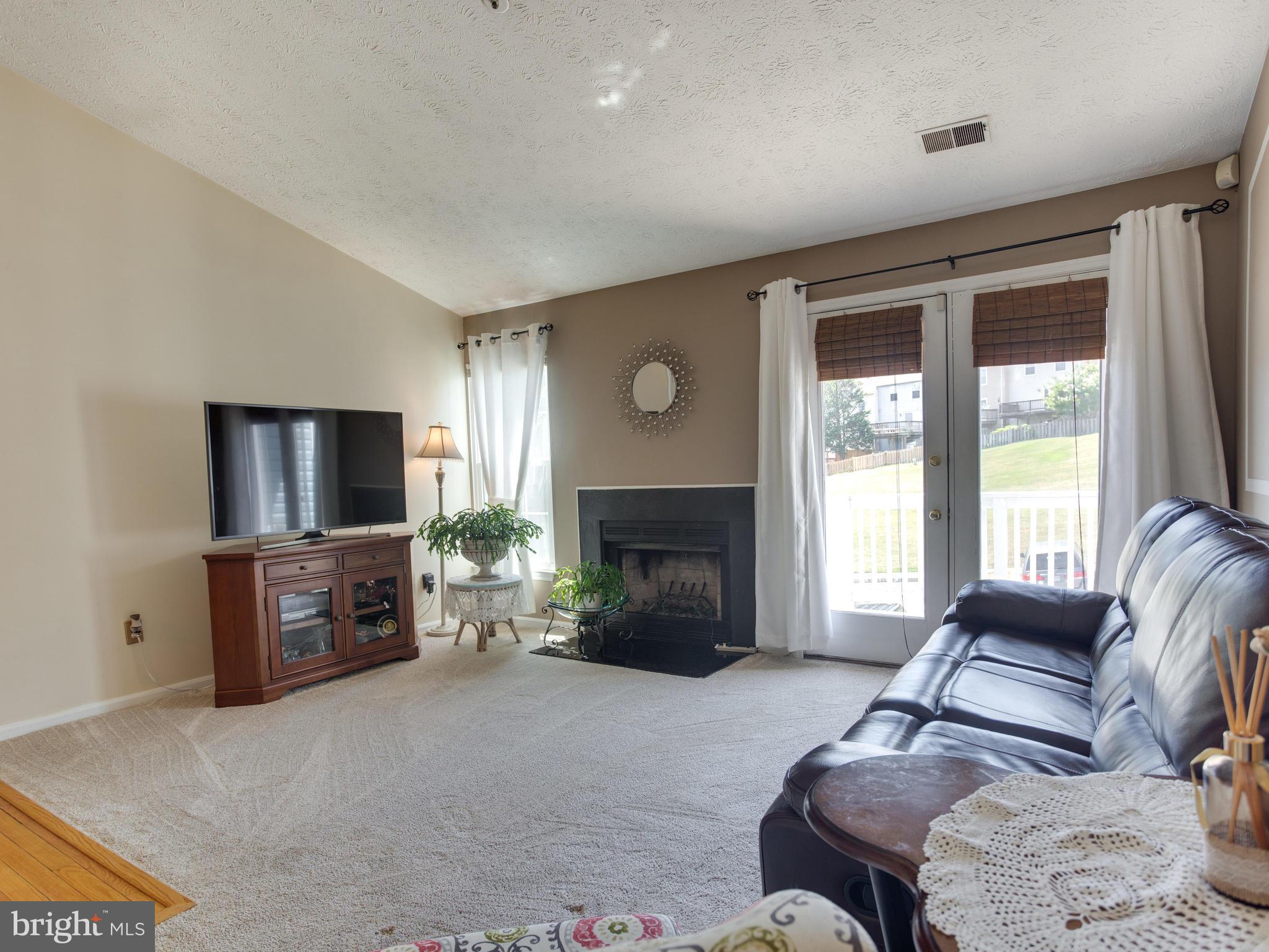6400 Greenfield Road, Unit 908 Elkridge, MD 21075 - Photo 4 of 21 Natural light fills the living room.