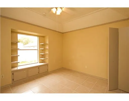 a view of a room with a window