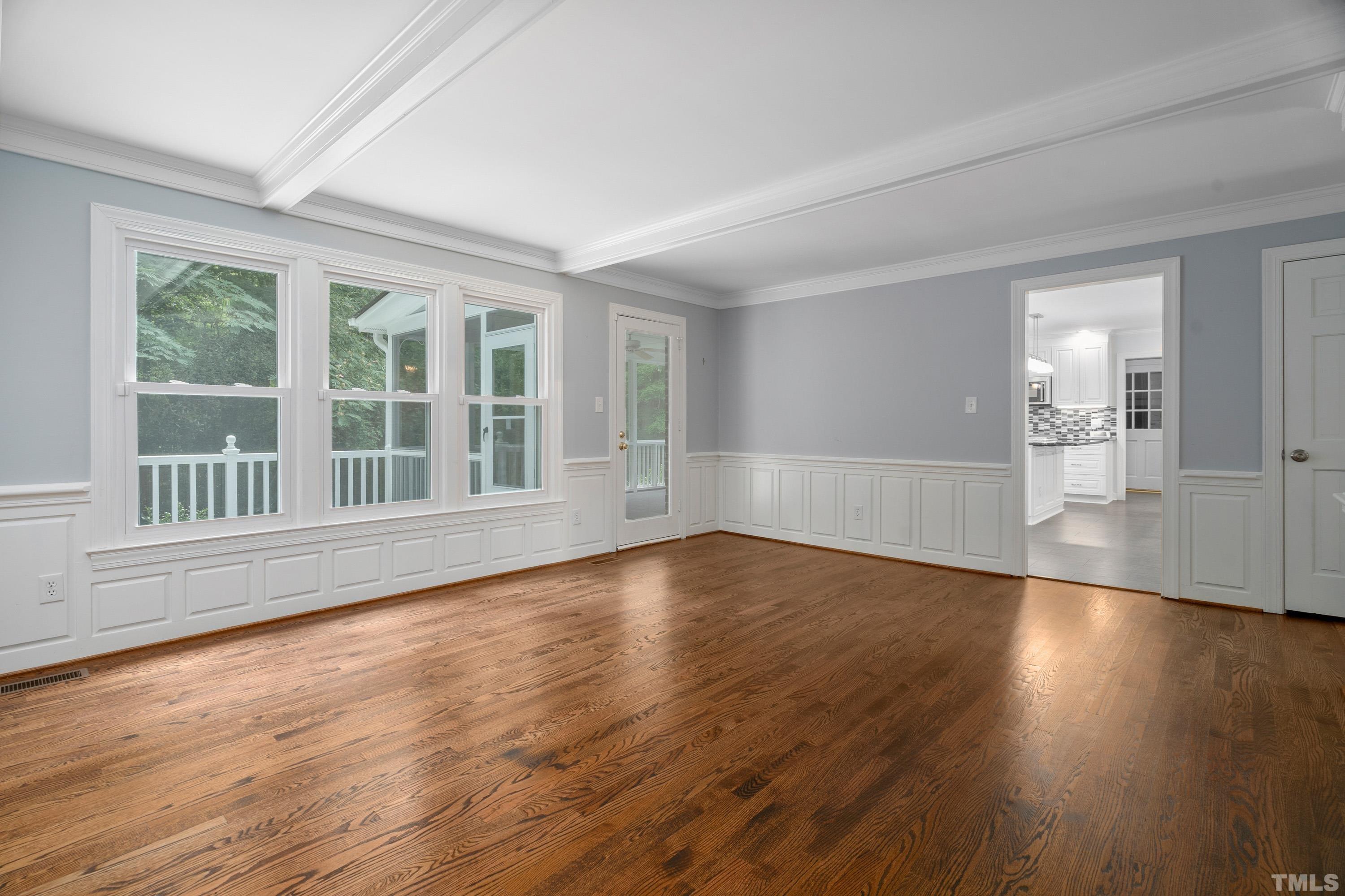 2013 Countrywood Road North Raleigh, NC 27615 - Photo 15 of 73 a view of empty room with wooden floor and fan