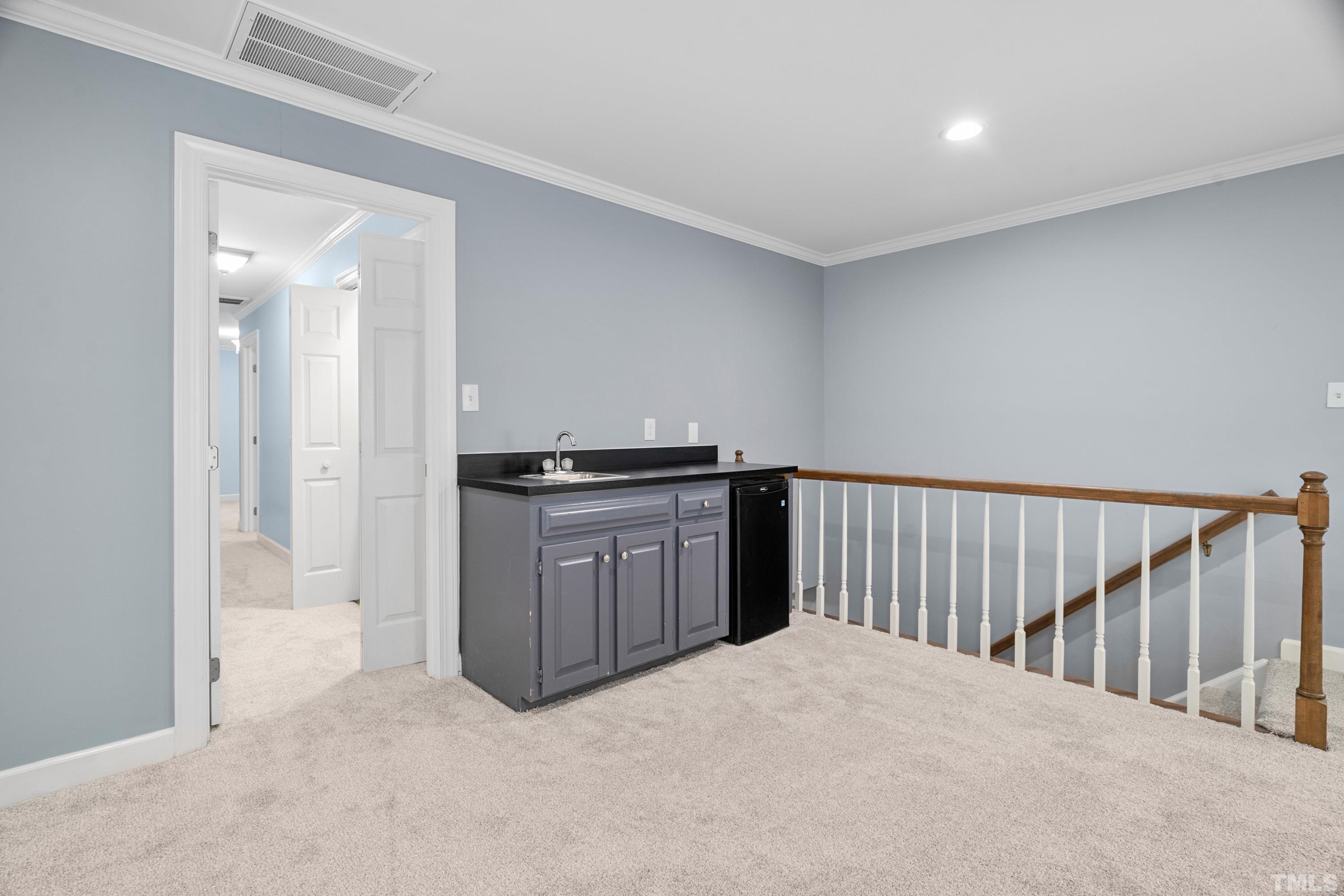 2013 Countrywood Road North Raleigh, NC 27615 - Photo 27 of 73 a view of a kitchen with a sink and dishwasher
