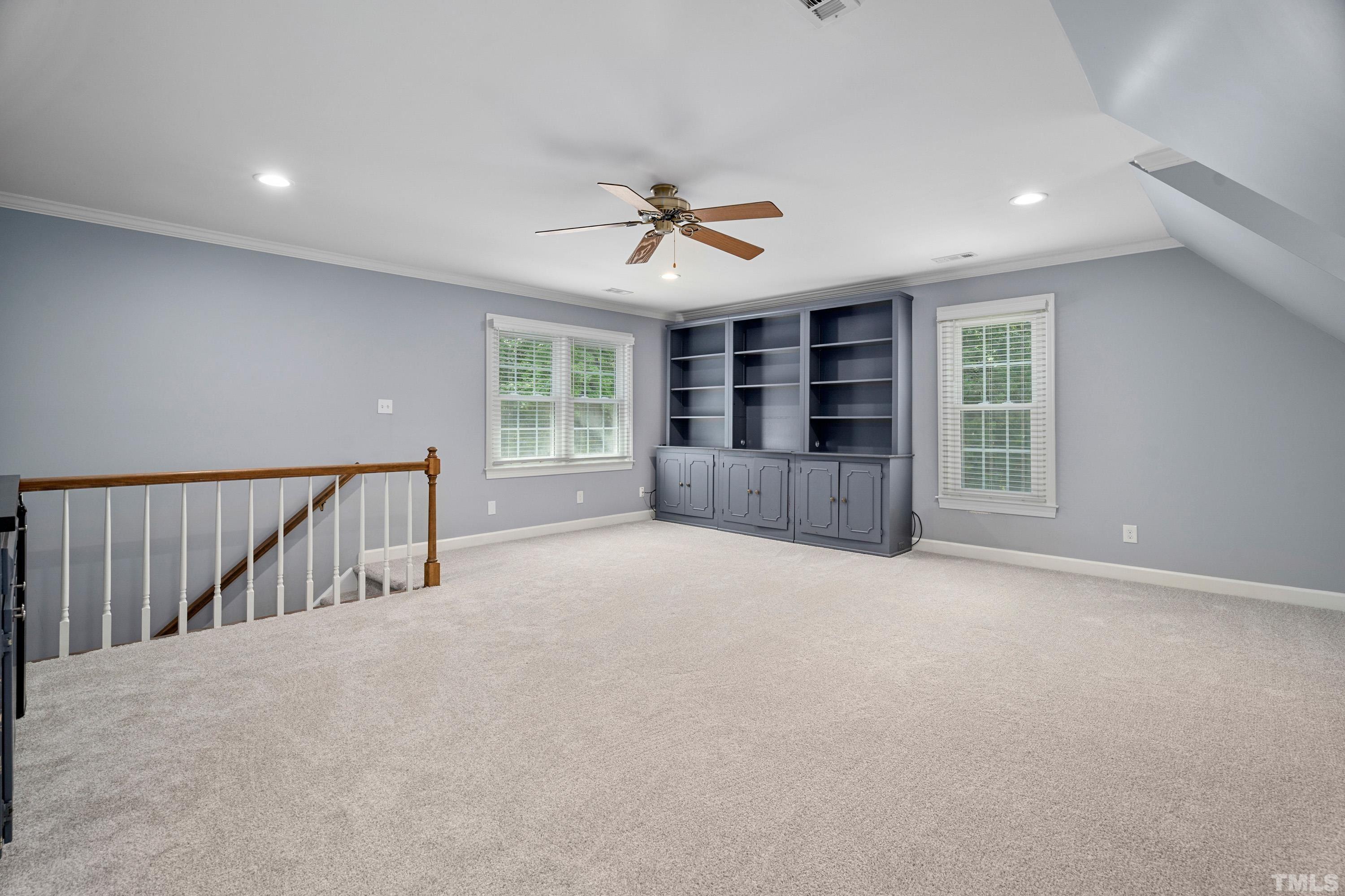 2013 Countrywood Road North Raleigh, NC 27615 - Photo 28 of 73 a view of an empty room with a window and a kitchen
