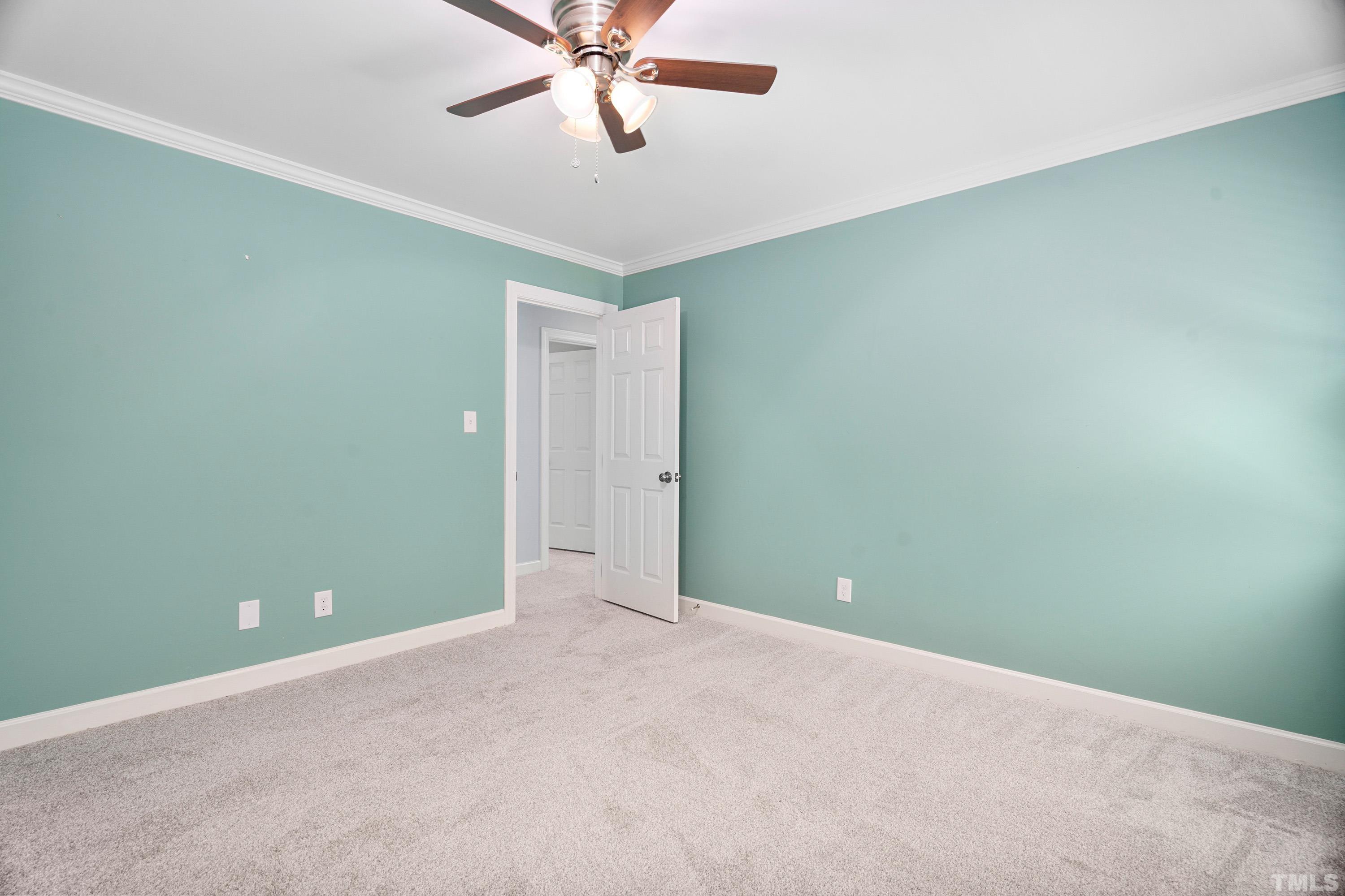 2013 Countrywood Road North Raleigh, NC 27615 - Photo 30 of 73 a view of an empty room with a fan