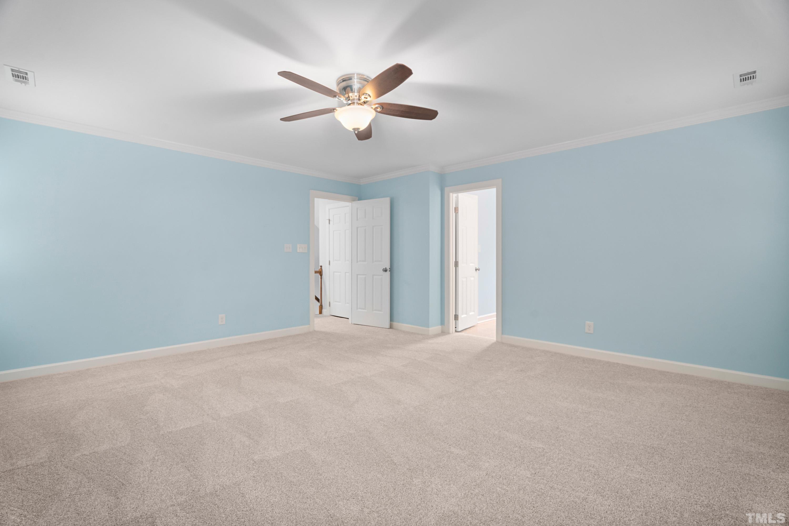 2013 Countrywood Road North Raleigh, NC 27615 - Photo 37 of 73 a view of an empty room with chandelier fan
