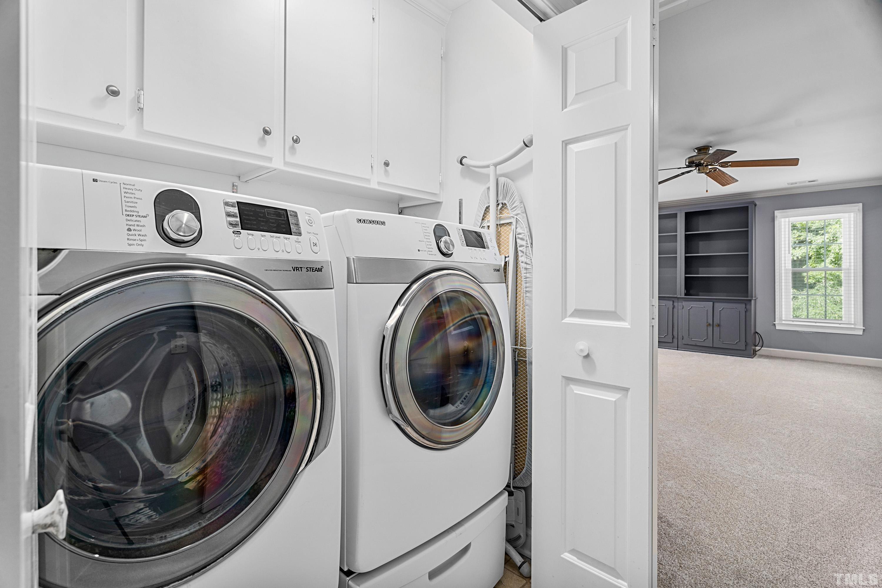 2013 Countrywood Road North Raleigh, NC 27615 - Photo 41 of 73 a utility room with dryer and washer