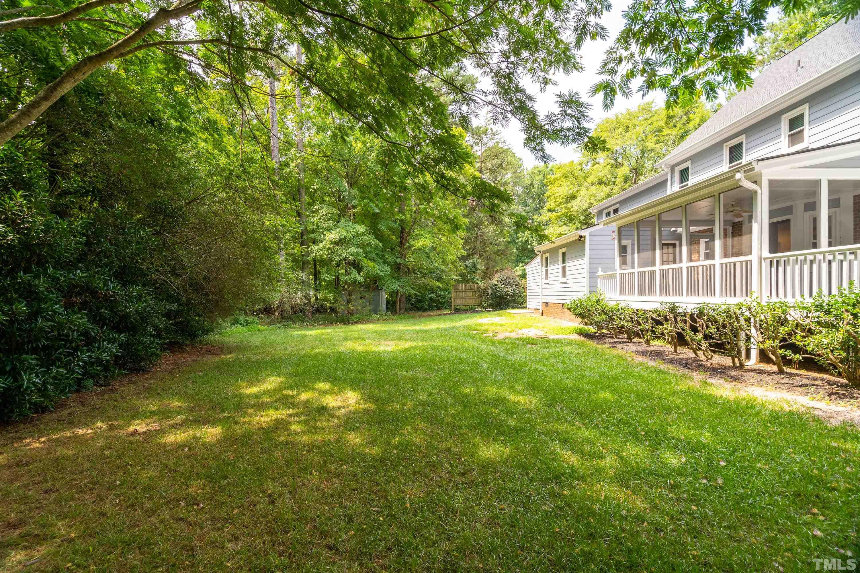 2013 Countrywood Road North Raleigh, NC 27615 - Photo 50 of 73 a view of a house with a yard