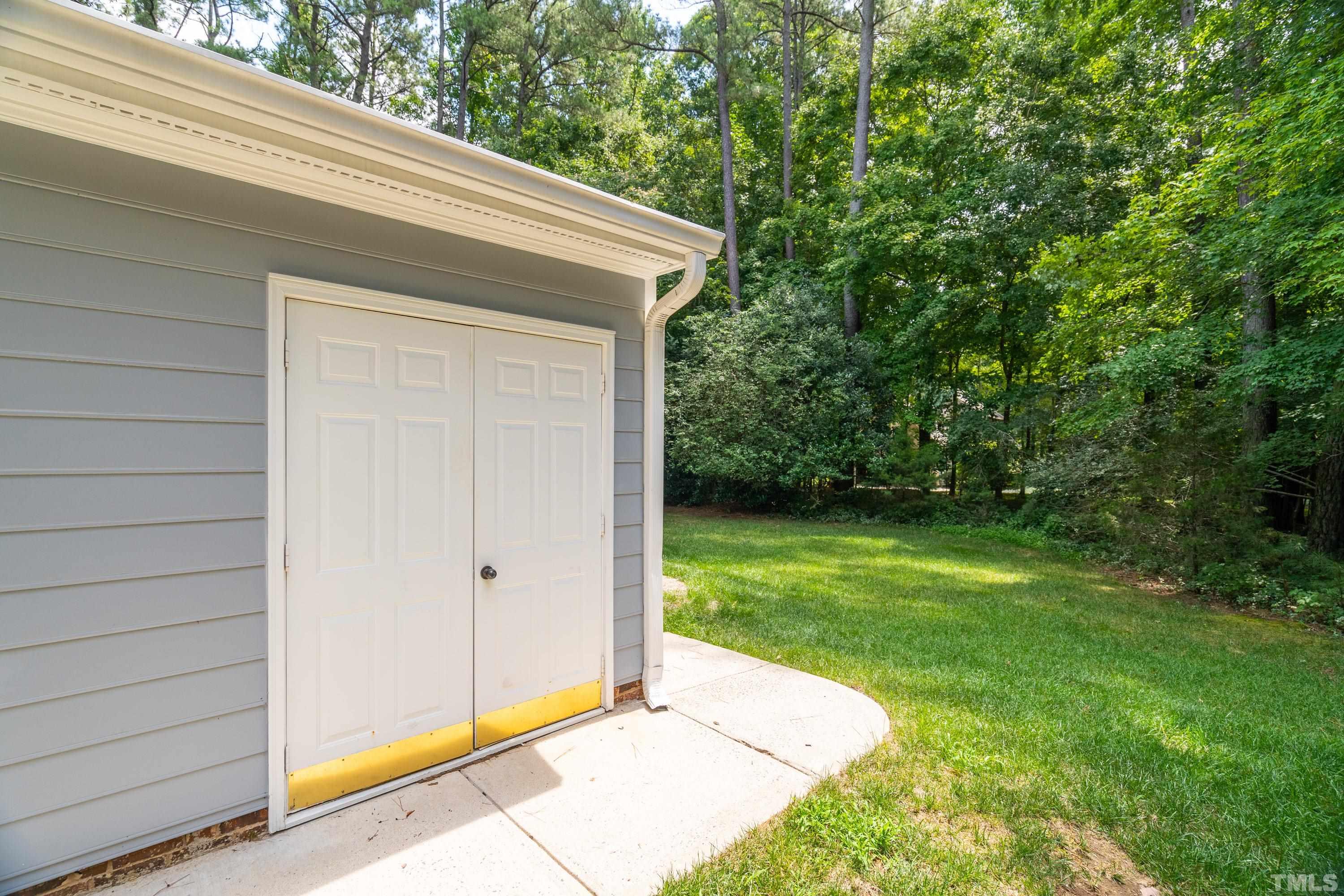 2013 Countrywood Road North Raleigh, NC 27615 - Photo 53 of 73 a view of backyard with cabin
