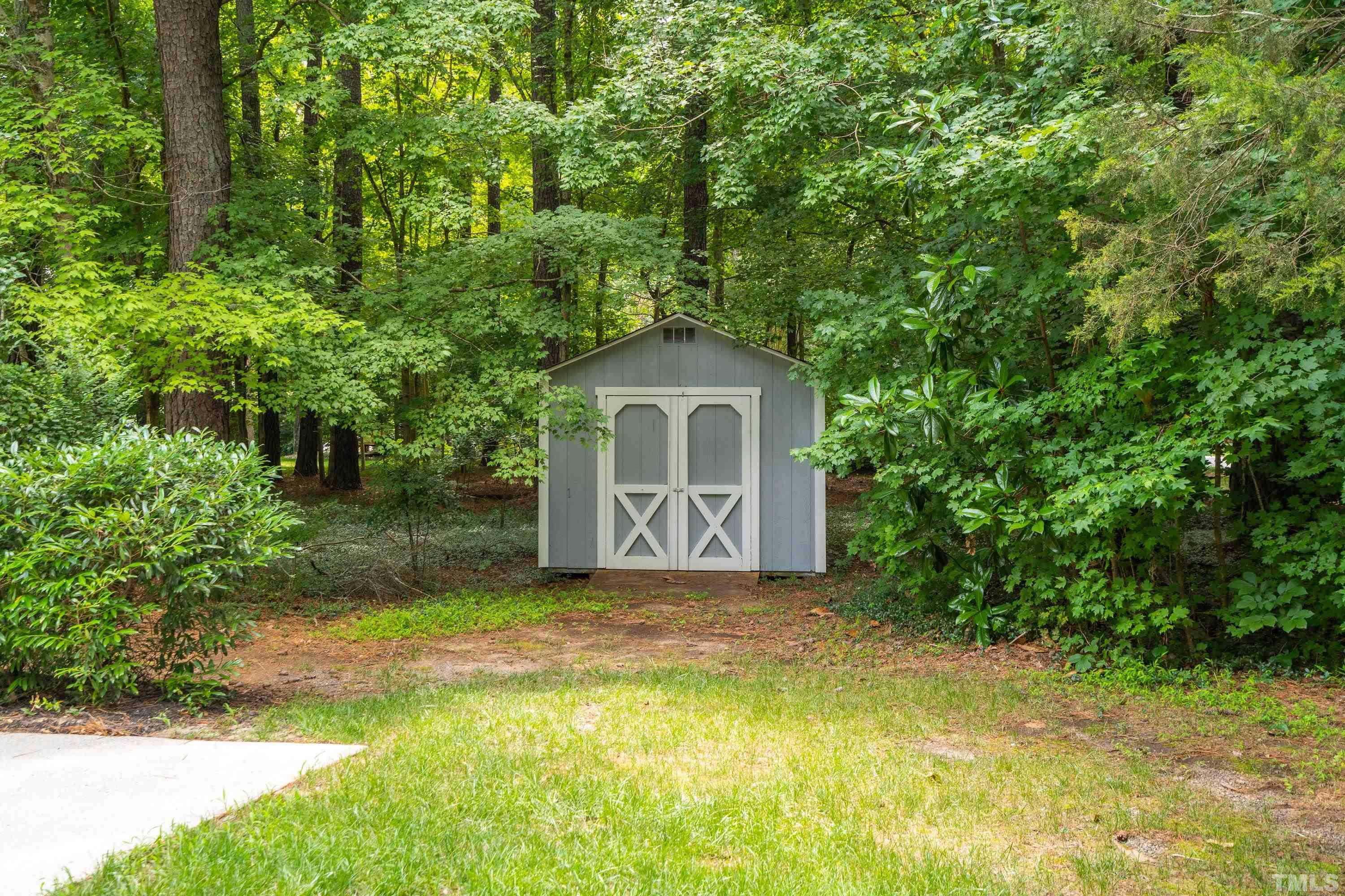 2013 Countrywood Road North Raleigh, NC 27615 - Photo 54 of 73 a front view of a house with a yard