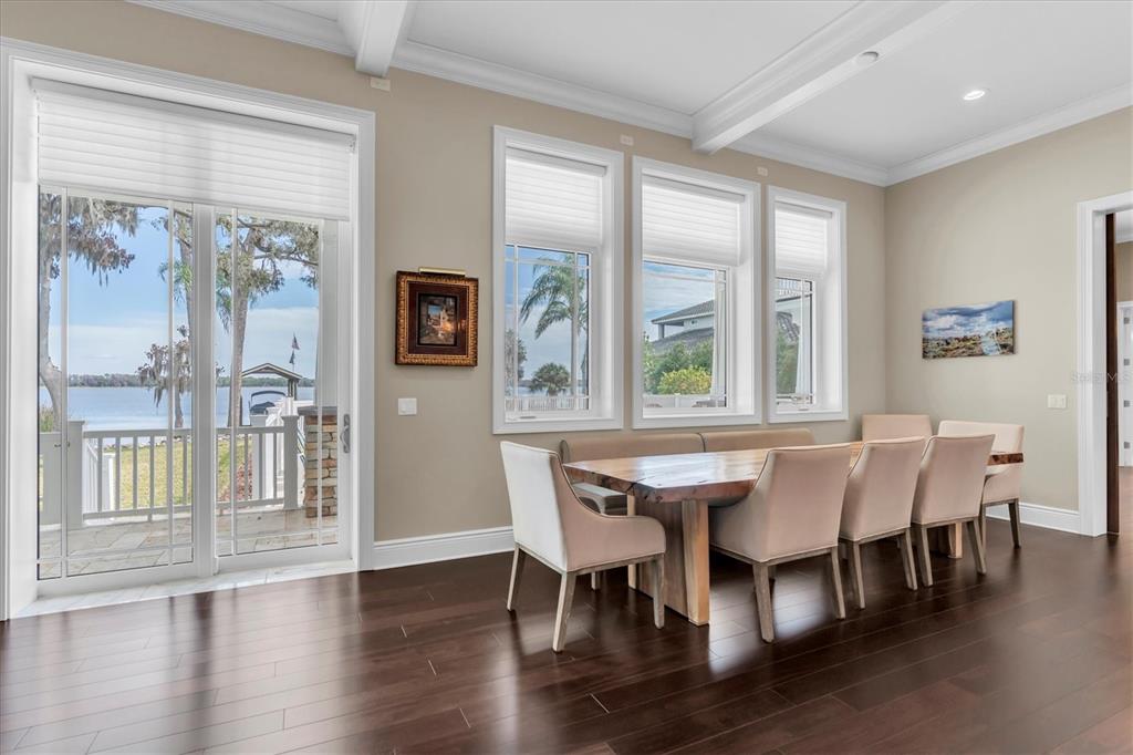 4650 Ridgeview Road Palm Harbor, FL 34684 - Photo 14 of 100 a view of a dining room with furniture window and wooden floor