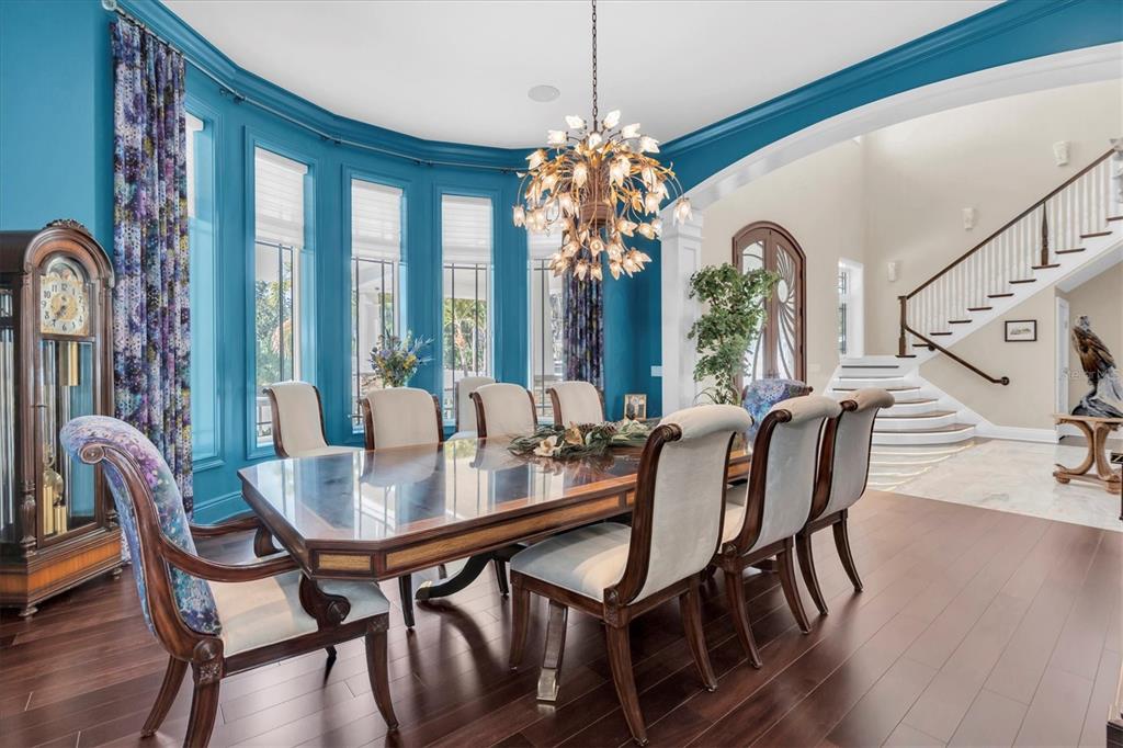 4650 Ridgeview Road Palm Harbor, FL 34684 - Photo 23 of 100 a view of a dining room with furniture window and wooden floor